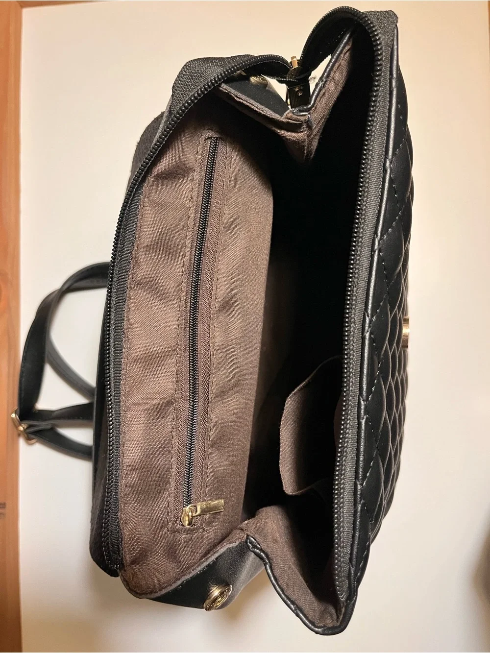 Black Quilted Backpack with Gold Charm